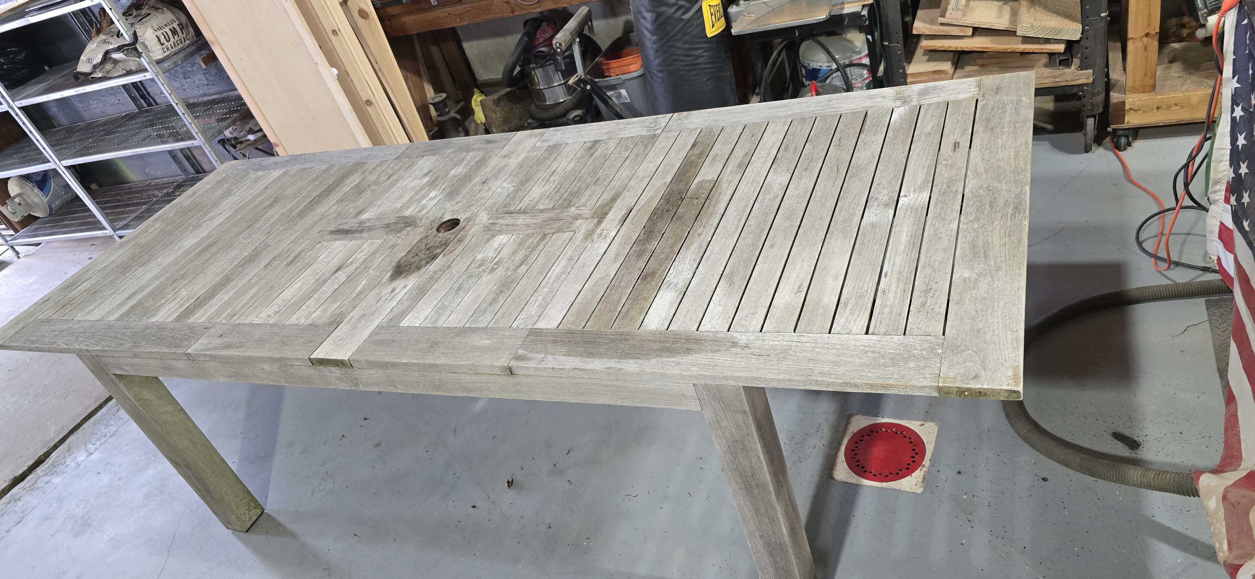 Teak outdoor table before restoration