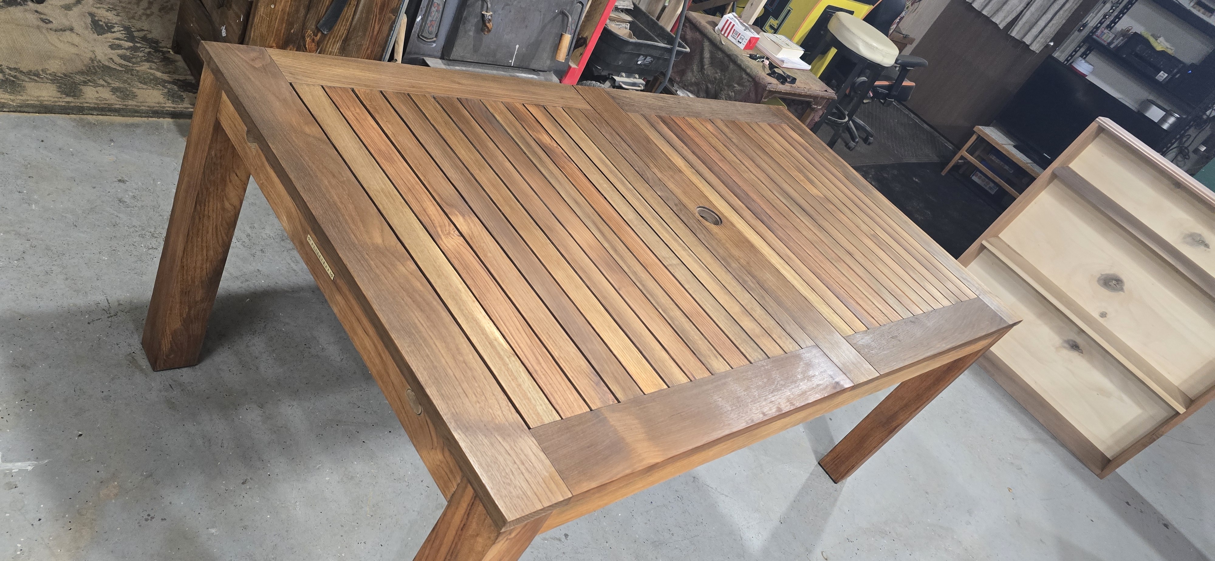 Teak outdoor table after restoration
