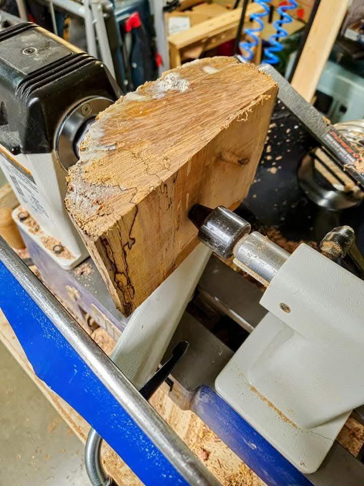 Bowl blank mounted on lathe